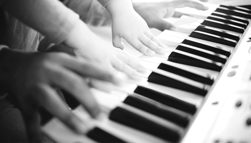 Little Boy Playing Keyboard